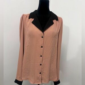 Business casual top that can be dressed up or down.